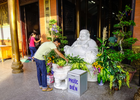 Long Xuyen, Vietnam - Sep 1, 2017. People praying at Chinese temple in Long Xuyen, Vietnam. Long Xuyen is the provincial city and capital city of An Giang Province.のeditorial素材
