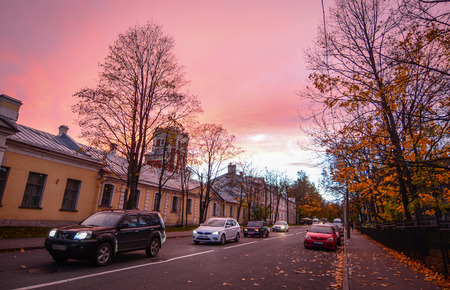 Saint Petersburg, Russia - Oct 7, 2016. Cars run on street at Pushkin Village in sunset in Saint Petersburg, Russia.のeditorial素材