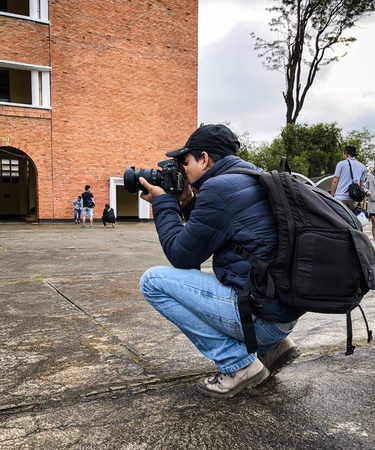 Dalat, Vietnam - Nov 22, 2017. A man taking pictures of Lycee Yersin School in Dalat, Vietnam. The school founded in 1927 in Da Lat, to educate the children of French colonialists.のeditorial素材