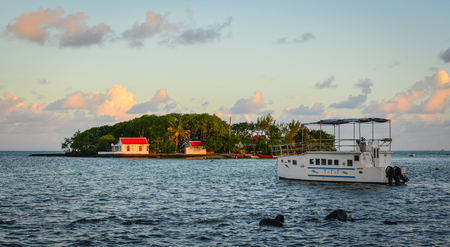 Mahebourg, Mauritius - Jan 3, 2017. A tourist ferry on the sea in Mahebourg, Mauritius. Mauritius, an Indian Ocean island nation, is known for its beaches, lagoons and reefs.のeditorial素材
