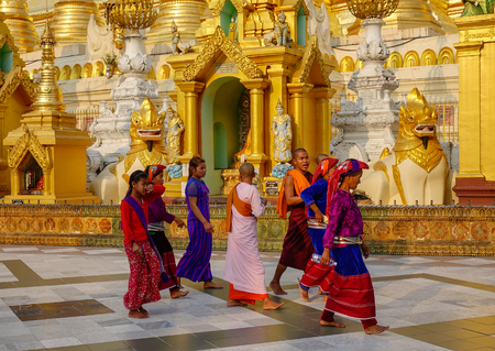 Yangon, Myanmar - Feb 26, 2016. Burmese people visit Shwedagon Pagoda in Yangon, Myanmar. Shwedagon is known as the most sacred and the largest Pagoda in Myanmar.のeditorial素材