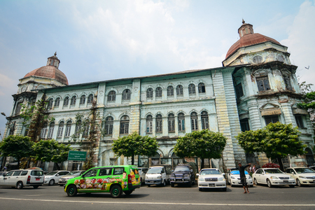 Yangon, Myanmar - Feb 26, 2016. Old buildings located at downtown in Yangon, Myanmar. Much of the architecture in downtown Yangon dates from the period of British rule.のeditorial素材