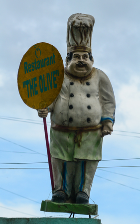 Bodhgaya, India - Jul 9, 2015. Chef cook statue at local restaurant in Bodhgaya, India. Bodh Gaya is considered one of most important Buddhist pilgrimage sites.のeditorial素材