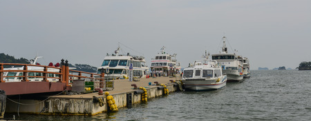 Matsushima, Japan - Sep 27, 2017. Boats waiting at tourist jetty in Matsushima, Japan. Matsushima has been ranked one of Japan three most scenic views for centuries.のeditorial素材