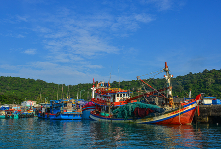 Tho Chau, Vietnam - Dec 14, 2017. Fishing boats docking at the pier in Tho Chau Island, Vietnam. Tho Chau Islands (Poulo Panjang) is an archipelago in the Gulf of Thailand.のeditorial素材