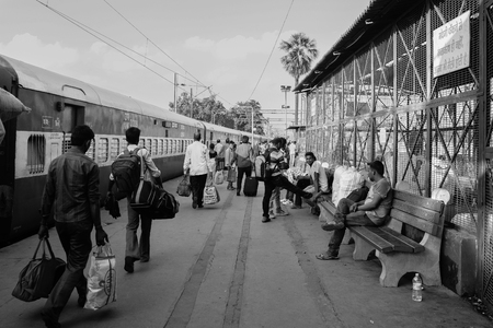 Varanasi, India - Jul 12, 2015. People walking at railway station in Varanasi, India. Varanasi is the holiest of the seven sacred cities (Sapta Puri) in Buddhism, Hinduism and Jainism.のeditorial素材