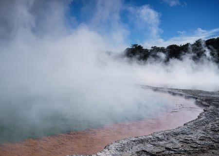 Champagne Pool (hot lake) at sunny day in Waiotapu, North Island of New Zealand. It is one of most unique geothermal and volcanic features.の写真素材