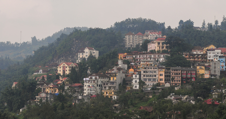 Sapa, Vietnam - Sep 20, 2013. Many hotels on the hill at downtown in Sapa, Northern Vietnam. Sa Pa is a town in northwest Vietnam not far from the Chinese border.のeditorial素材