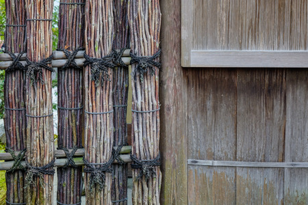 Wooden fence of an ancient Shinto Shrine in Kyoto, Japan.の写真素材