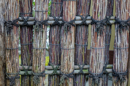 Wooden fence of an ancient Shinto Shrine in Kyoto, Japan.