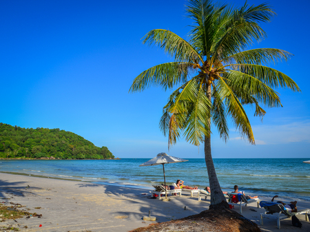 Phu Quoc, Vietnam - Dec 7, 2017. People enjoy on beach in Phu Quoc, Vietnam. Phu Quoc is an island off the coast of Cambodia in the Gulf of Thailand.の写真素材