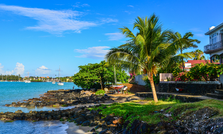 Grand Baie, Mauritius - Jan 9, 2017. Seaside houses in Grand Baie, Mauritius Island. Mauritius is a major tourist destination, ranking 3rd in the region.のeditorial素材