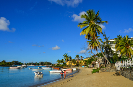 Mahebourg, Mauritius - Jan 9, 2017. Tourists enjoying on beach in Mahebourg, Mauritius. Mauritius is a major tourist destination, ranking 3rd in the region.のeditorial素材