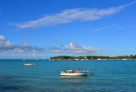 Grand Baie, Mauritius - Jan 9, 2017. Beautiful sea under blue sky at sunny day in Grand Baie, Mauritius Island. Mauritius is a small, multi-cultural island in the Indian Ocean.のeditorial素材