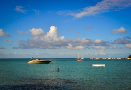 Grand Baie, Mauritius - Jan 9, 2017. Boats on beautiful sea in Grand Baie, Mauritius Island. Mauritius is 2,000 km (1,200 mi) off the southeast coast of Africa.のeditorial素材