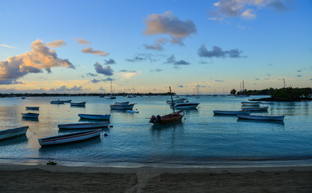 Mahebourg, Mauritius - Jan 9, 2017. Boats docking on beach at twilight in Mahebourg, Mauritius. Mauritius is a major tourist destination, ranking 3rd in the region.のeditorial素材