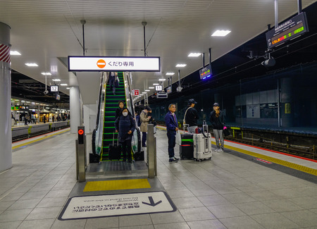 Kyoto, Japan - Nov 29, 2016. People waiting for the train at JR Shinkansen Station in Kyoto, Japan.のeditorial素材