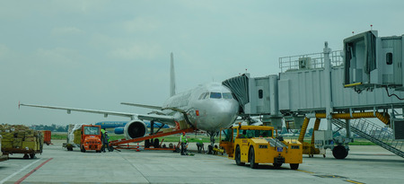 Saigon, Vietnam - Mar 28, 2017. An aircraft docking at Tan Son Nhat Airport in Saigon, Vietnam. Tan...