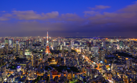 Tokyo, Japan - Sep 29, 2017. Business district with Tokyo Tower at night. Tokyo ranked first in the Global Economic Power Index and third in the Global Cities Index.のeditorial素材
