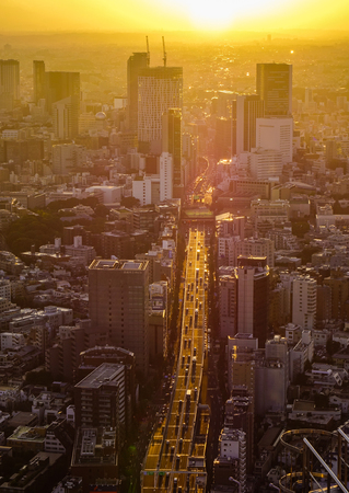 Tokyo, Japan - Sep 29, 2017. Sunset avenue at business district in Tokyo, Japan. Tokyo is the capital of Japan, and the place where over 13 million people live.のeditorial素材