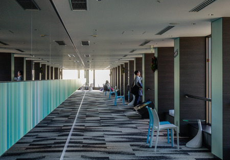 Tokyo, Japan - Jan 4, 2016. Modern hall of office building in Tokyo, Japan. Tokyo has the largest metropolitan economy in the world.のeditorial素材