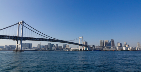 Tokyo, Japan - Jan 4, 2016. Rainbow Bridge on Tokyo Bay, Japan. The bay is inlet of the Pacific Ocean on the east-central coast of east-central Honshu.のeditorial素材