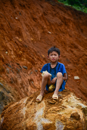 Sa Pa, Vietnam - May 31, 2016. Portrait of ethnic boy in Sa Pa, Vietnam. Sa Pa is a mountain town in Lao Cai, northwestern Vietnam.のeditorial素材