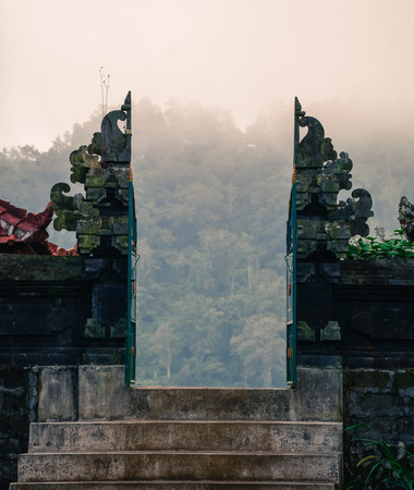 Stone gate of ancient temple in Bali, Indonesia.の写真素材