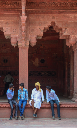 Agra, India - Jul 13, 2015. People sitting at Agra Fort in Agra, India. The fort was main residence of the emperors of the Mughal Dynasty till 1638.のeditorial素材