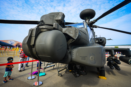 Singapore  - Feb 10, 2018. A Boeing AH-64 Apache helicopter belong to the Singapore Air Force sits on display at the 2018 Singapore Airshow.のeditorial素材