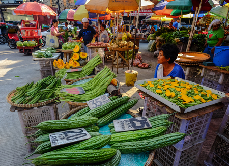 Manila, Philippines - Apr 12, 2017. Selling fruits and vegetables at local market in Manila, Philippines.のeditorial素材