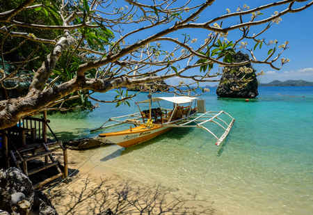 Palawan, Philippines - Apr 11, 2017. Wooden boat waiting at pier in Palawan, Philippines. Palawan is one of the most beautiful islands in the world.のeditorial素材