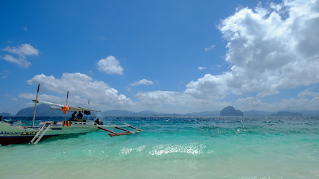 Palawan, Philippines - Apr 6, 2017. A tourist boat waiting on sea in Palawan, Philippines. Palawan is one of the most beautiful islands in the world.のeditorial素材