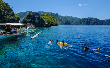 Coron, Philippines - Apr 10, 2017. Tourists enjoy on sea in Coron Island, Philippines. Coron is a wedge-shaped limestone island in the province of Palawan.のeditorial素材