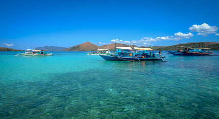 Coron, Philippines - Apr 10, 2017. Tourist boats on sea in Coron Island, Philippines. Coron is a wedge-shaped limestone island in the province of Palawan.のeditorial素材