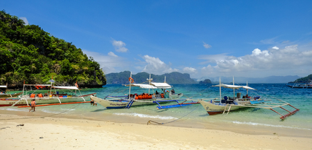 Palawan, Philippines - Apr 6, 2017. Wooden boats waiting at pier in Palawan, Philippines. Palawan is one of the most beautiful islands in the world.のeditorial素材
