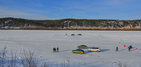 Mohe, China - Feb 19, 2017. Tourists walking on ice river at winter in Mohe County, Heilongjiang Province, China.のeditorial素材