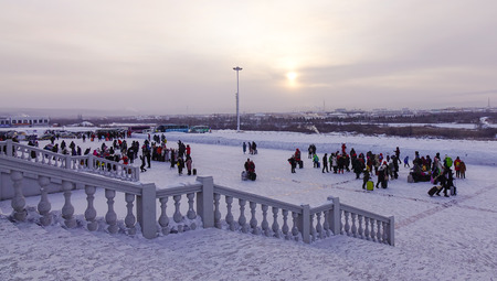 Mohe, China - Feb 19, 2017. People walking on main square at winter in Mohe County, Heilongjiang Province, China.のeditorial素材