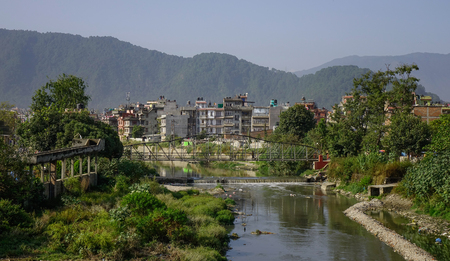Kathmandu cityscape with a polluted river. Kathmandu is the largest metropolis in Nepal, with a population of 3 million.の写真素材