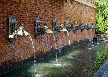 Brick fountain with animal heads at ancient palace in Kathmandu, Nepal.の写真素材