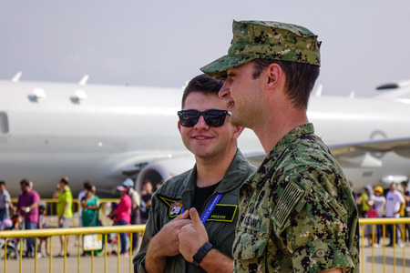Singapore - Feb 10, 2018. US Air Force (USAF) soldiers with aircrafts in Changi, Singapore.