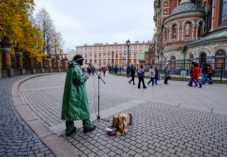 St. Petersburg, Russia - Oct 13, 2016. A street musician performing on square in St. Petersburg, Russia.のeditorial素材