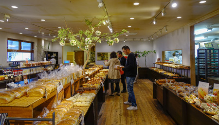 Mie, Japan - Mar 16, 2018. People buying bread at the bakery in Mie, Japan.のeditorial素材