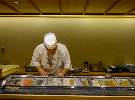 Nagoya, Japan - Mar 17, 2018. Sushi cook working at traditional restaurant in Nagoya, Japan.のeditorial素材