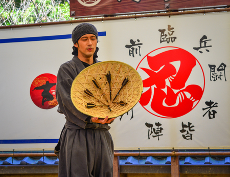 Iga City, Japan - Mar 17, 2018. A man wearing Ninja costume and teaching at the Ninja School in Iga City, Japan.のeditorial素材