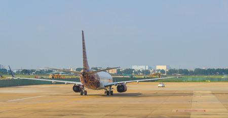 Saigon, Vietnam - Dec 6, 2017. A civil aircraft on runway at Tan Son Nhat Airport (SGN) in Saigon...