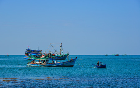 Kien Giang, Vietnam - Dec 6, 2017. Fishing boats on blue sea in Phu Quoc Island, Kien Giang, Vietnam.のeditorial素材
