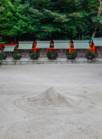 Ancient temple at autumn forest in Kyoto, Japan.のeditorial素材