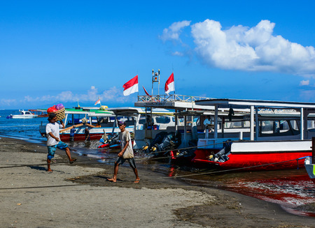 Bali, Indonesia - Apr 17, 2016. Passengers coming to the ferry at tourist pier in Bali Island, Indonesia.のeditorial素材