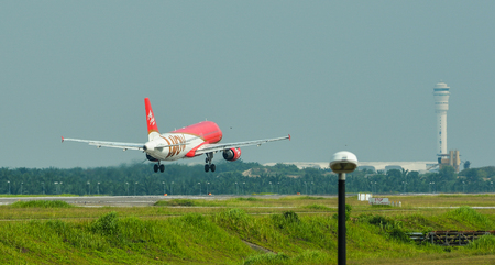 Kuala Lumpur, Malaysia - May 3, 2018. An Airbus A320 of AirAsia landing at Kuala Lumpur International Airport (KLIA).のeditorial素材